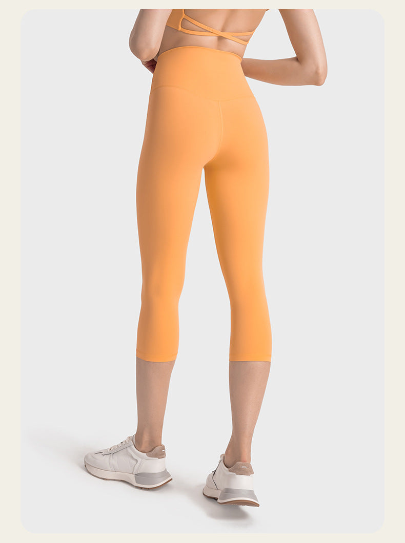 Orange strækbare yogabukser med høj talje 