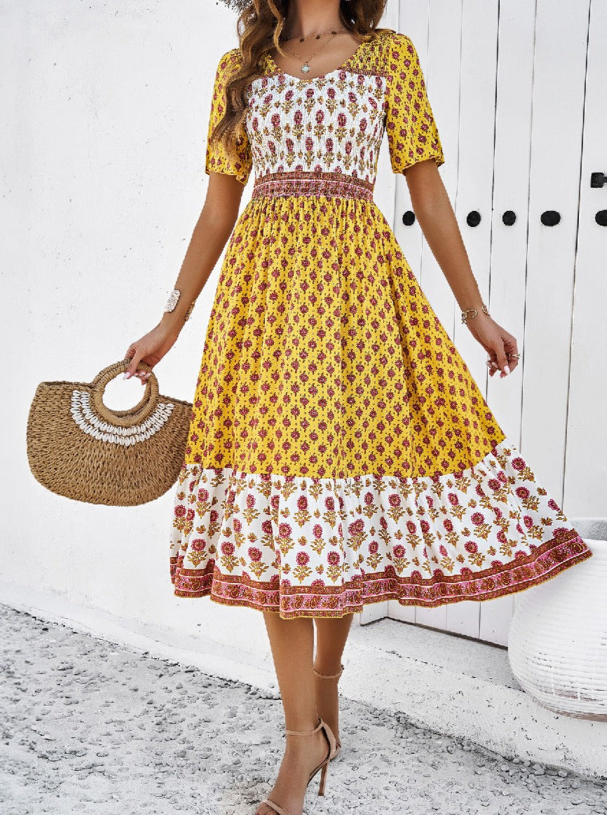 Elegant solkjole med retro-blomstret print 