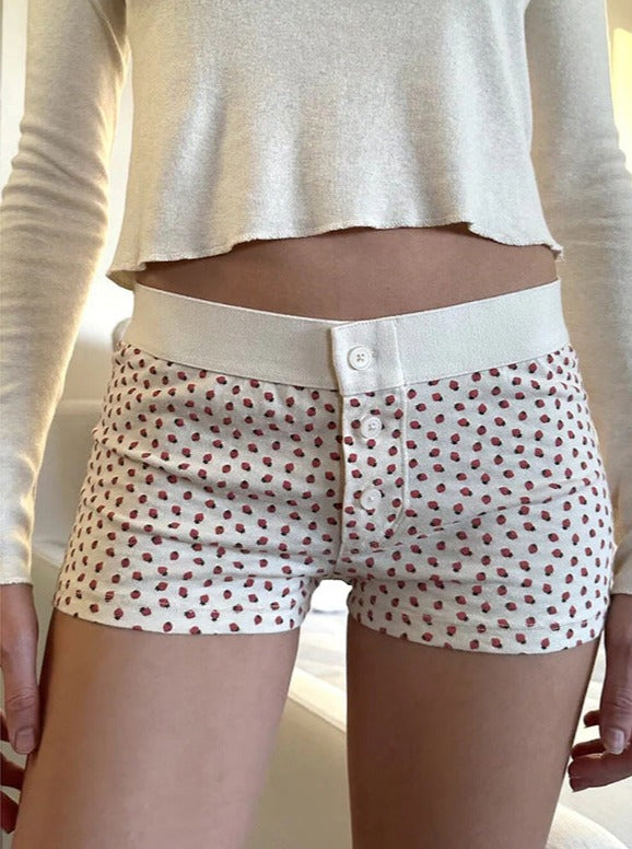 Hvide jordbær-trykte shorts med knap 
