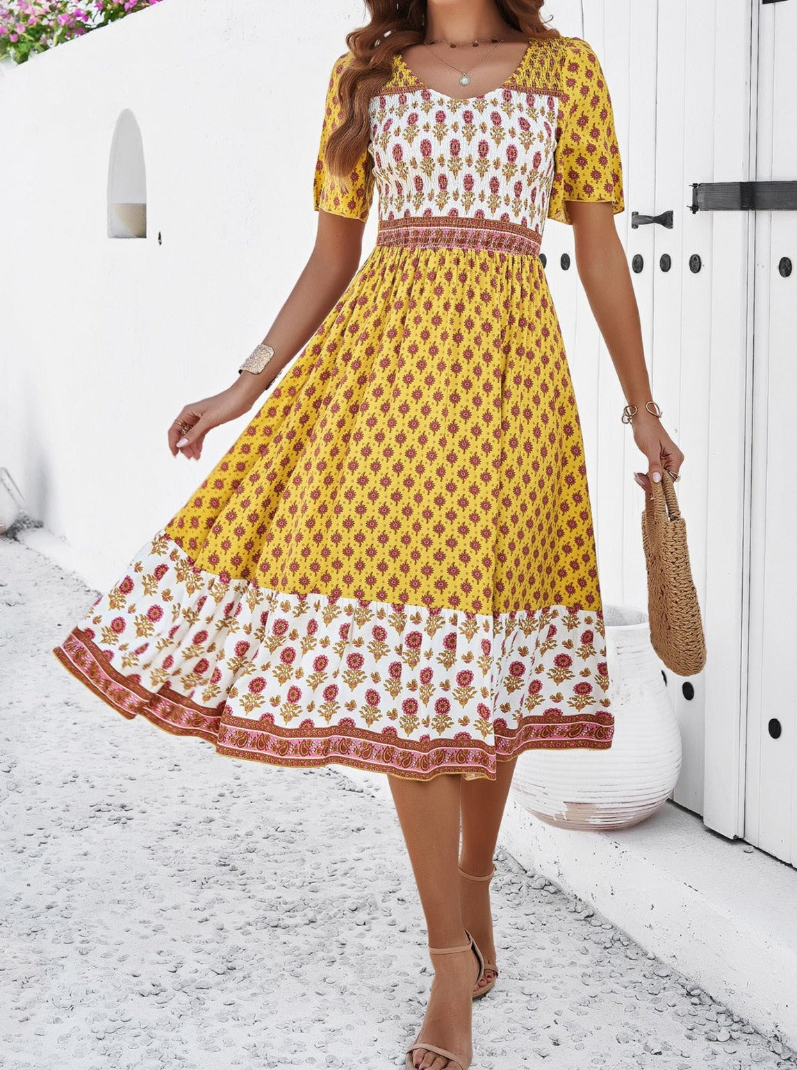 Elegant solkjole med retro-blomstret print 